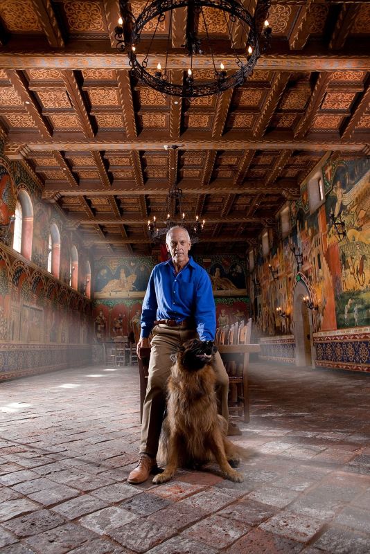Dario Sattui at Castello di Amorosa with his dog Lupo